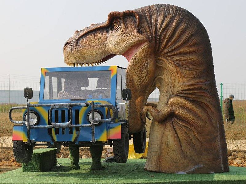 Interactive sensor-triggered animatronic dinosaur exhibit