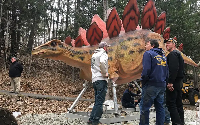 On-site installation of animatronic dinosaur exhibits