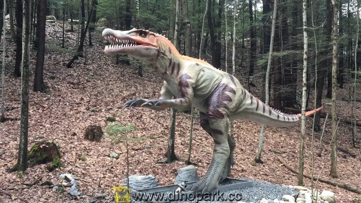 Life-size animatronic Baryonyx dinosaur in a running pose with its long crocodile-like snout and raised thumb claws
