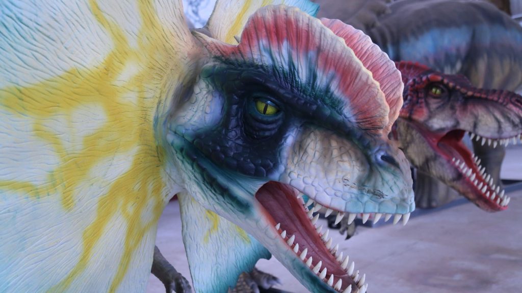 Close-up of an animatronic Spinosaurus open jaw showing individually modelled teeth