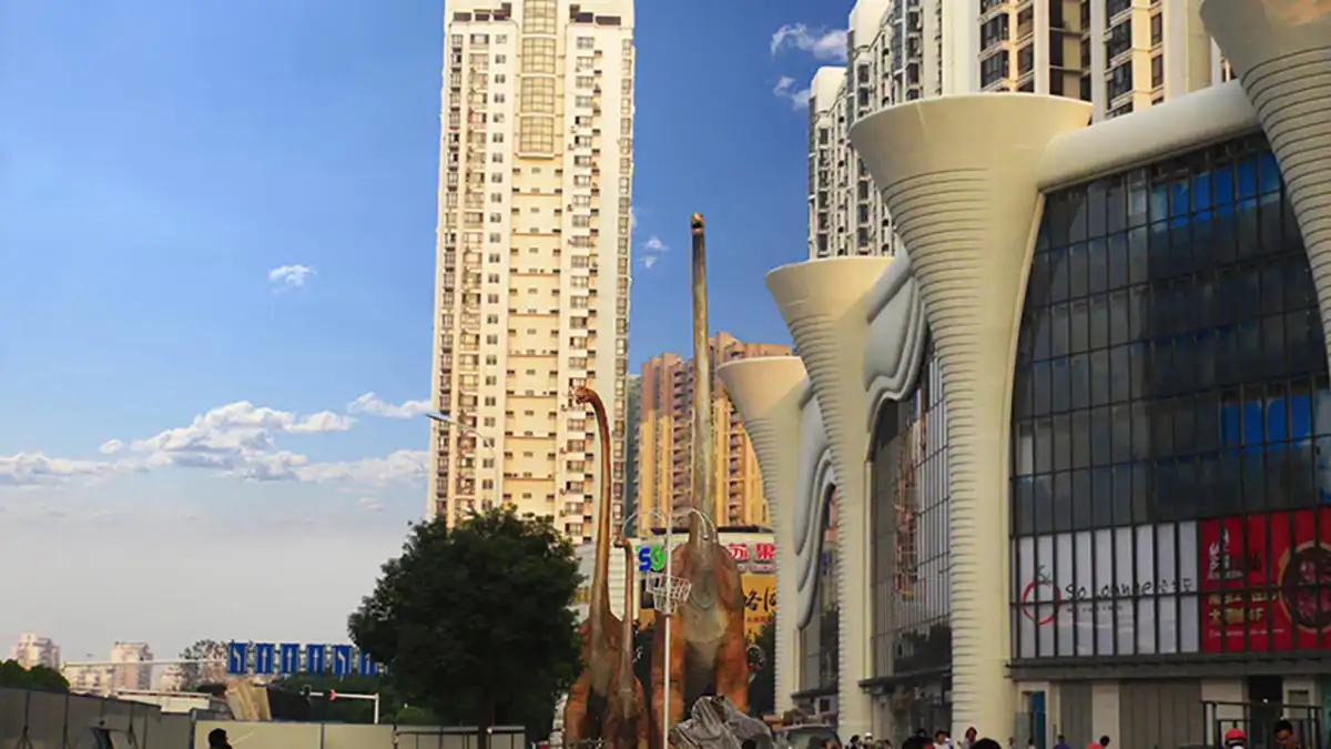 Brachiosaurus herd in a shopping mall plaza — giant animatronic dinosaur commercial display in Nanjing