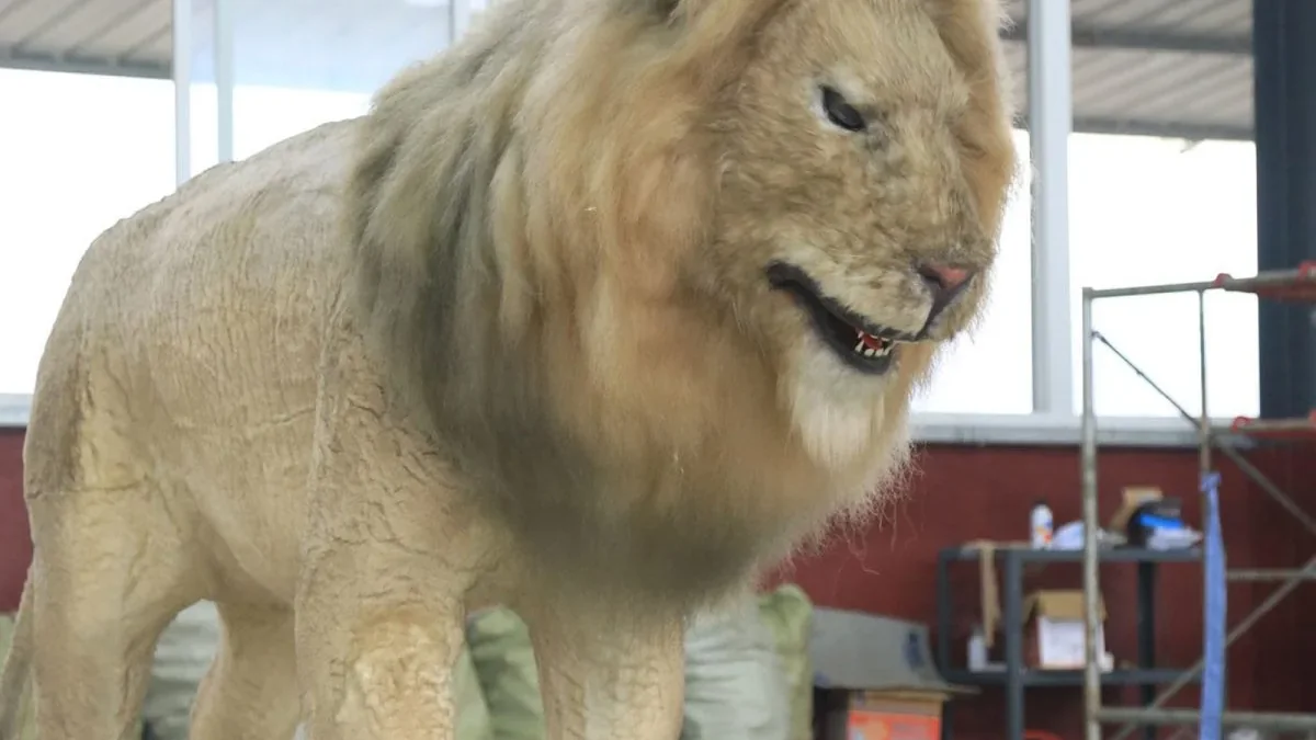 Close detail of an animatronic lion head and mane