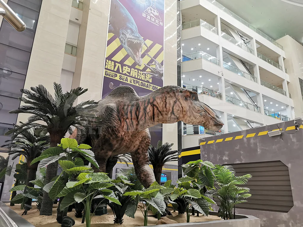 Static dinosaur model display in a retail mall