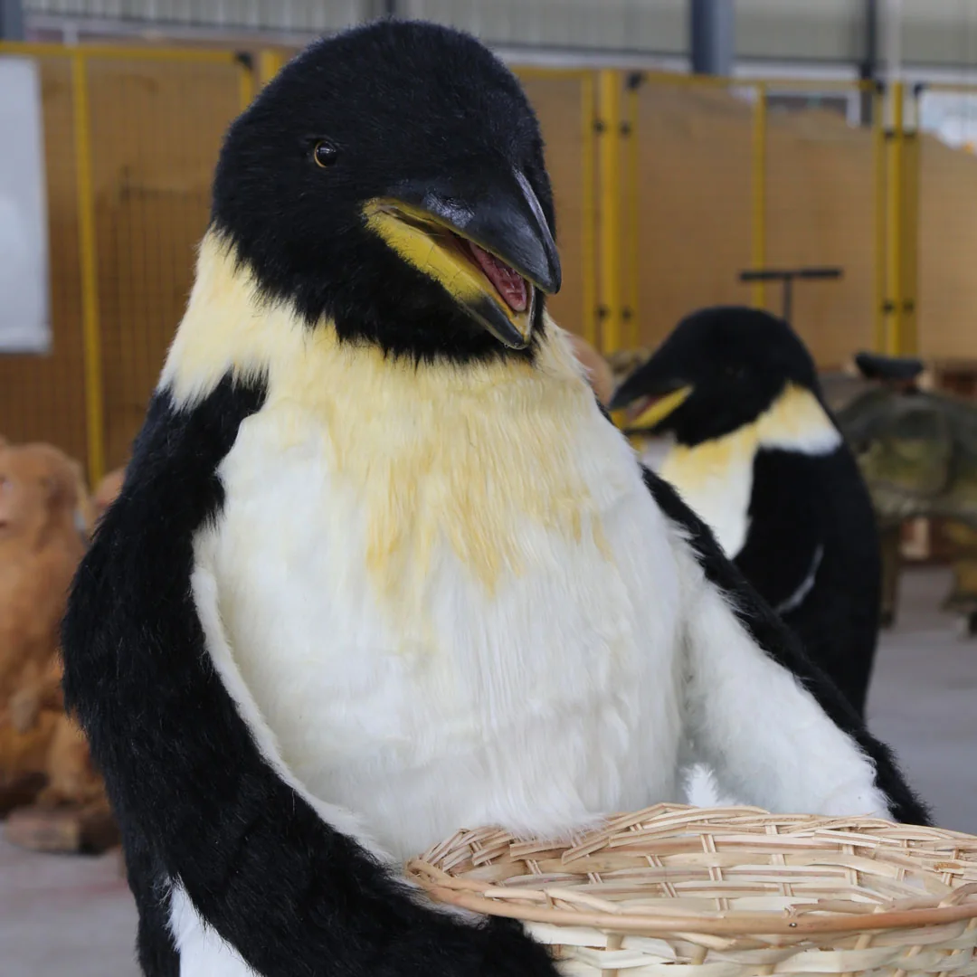 Animatronic penguin side view showing plumage and posture