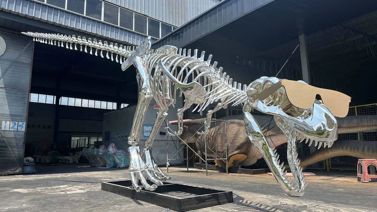 T-Rex skeleton replica side profile showing skull, ribcage and tail balance