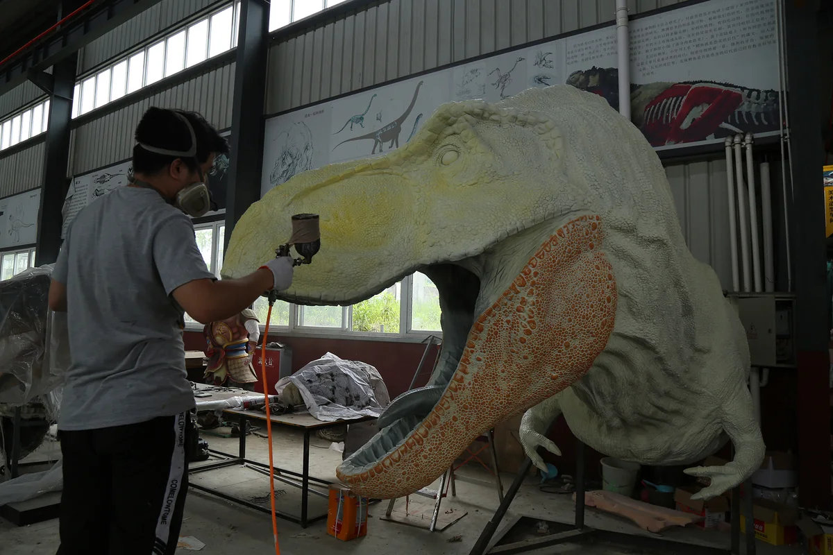 T-Rex hand-finished surface post-overmolding finishing and seam treatment process