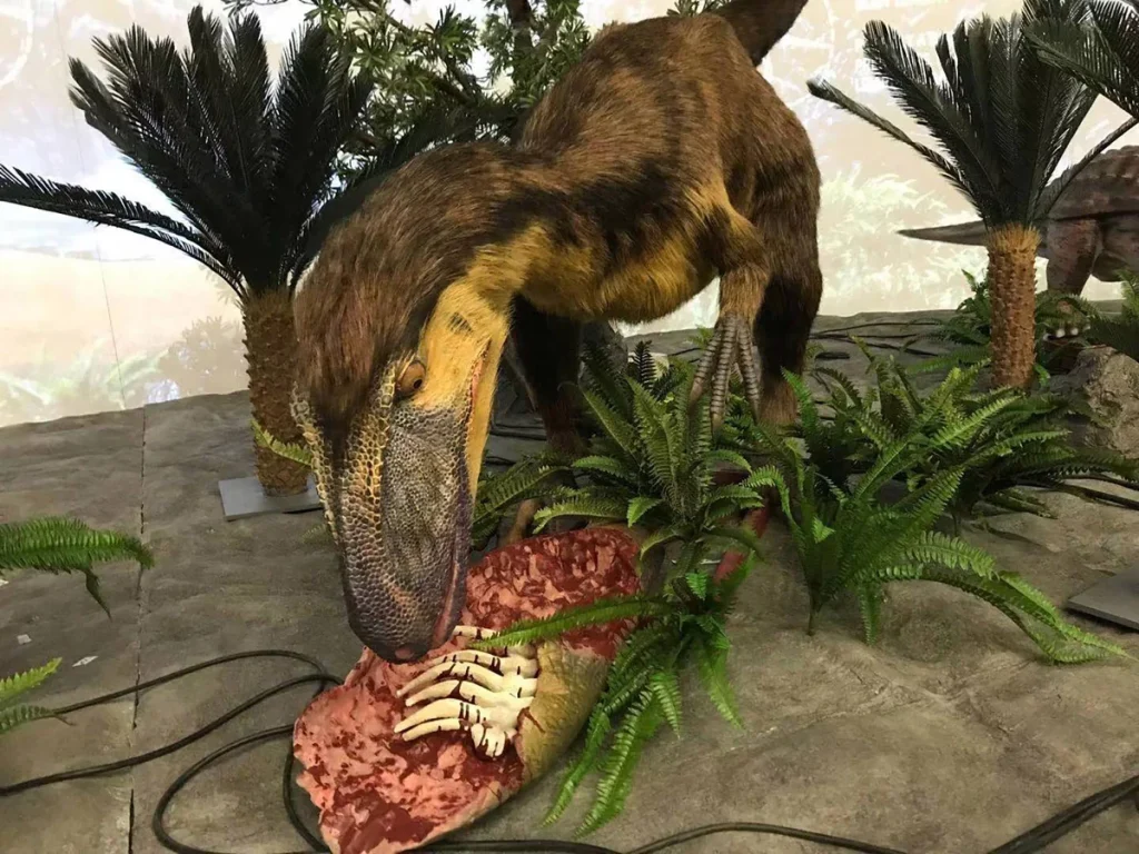 Talarurus animatronic model three-quarter view showing the banded armor across the back and the club at the end of the tail