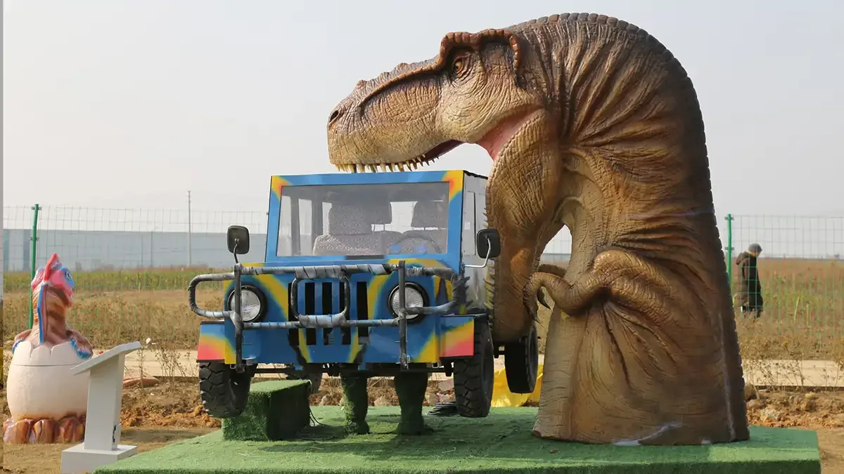 Interactive animatronic T-Rex bites car exhibit with the jaws around a vehicle body