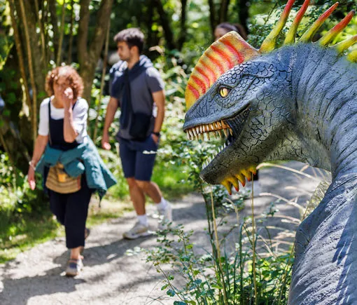 Animatronic predator beside the walking path in the UK park